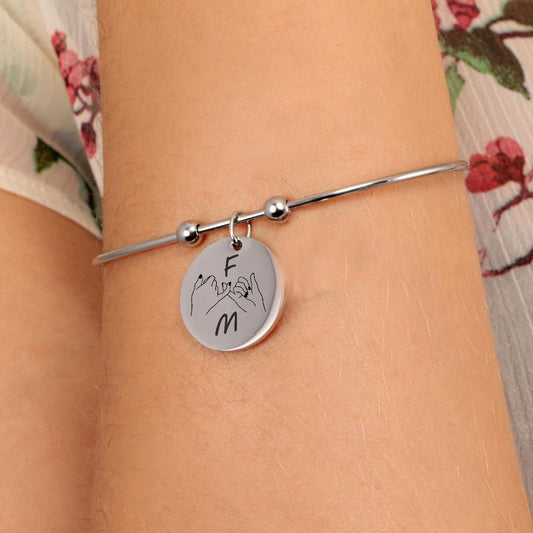 Bracciale rigido con pendente personalizzato